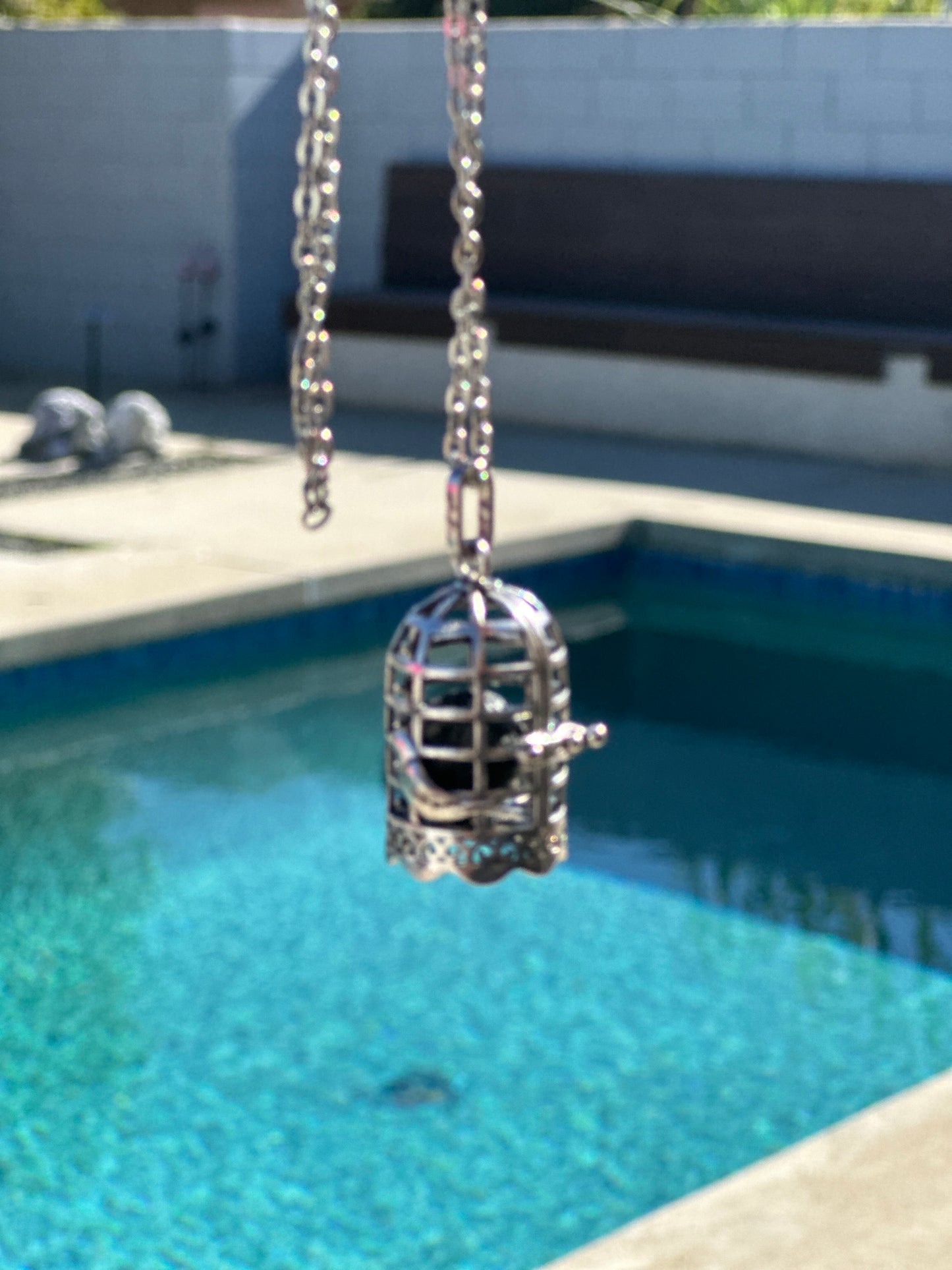 Bird Necklace with lava bead.