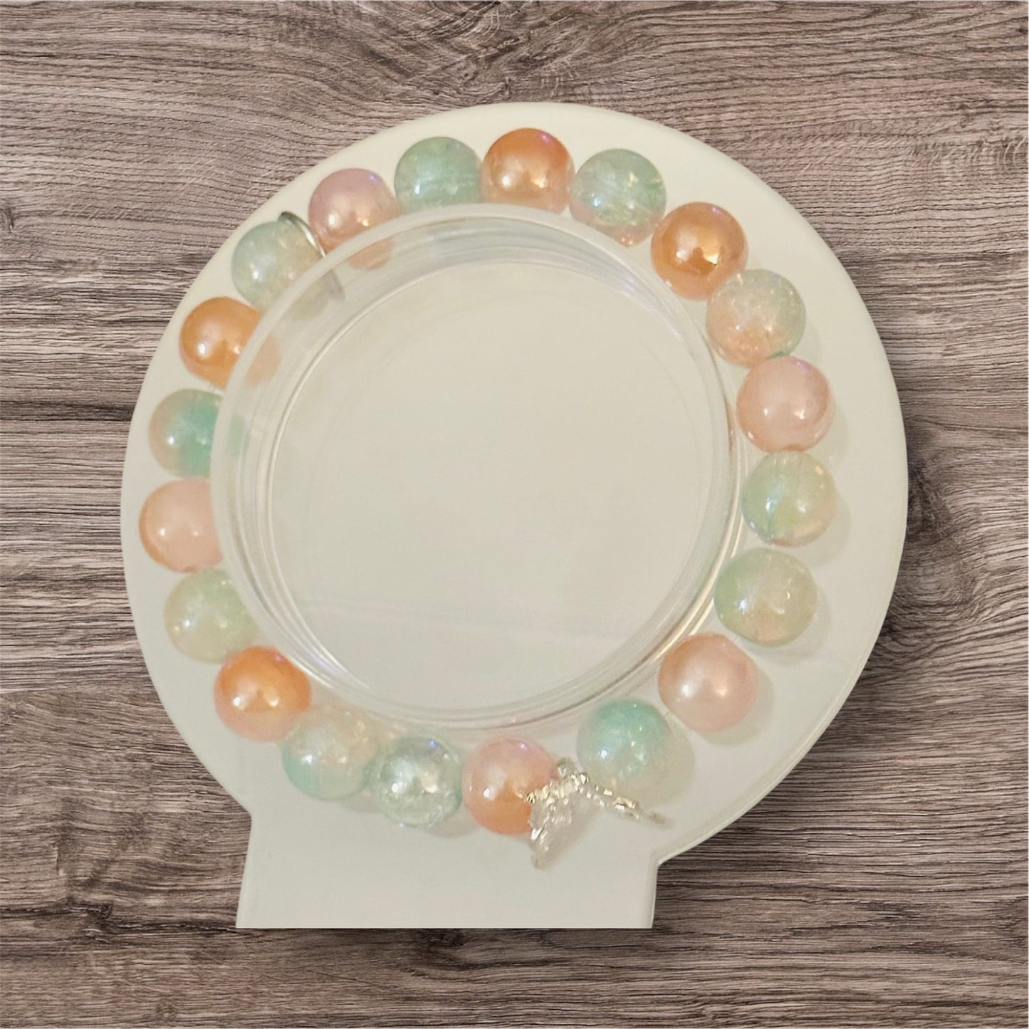 Pink-Green and Orange Bracelet with silver butterfly.